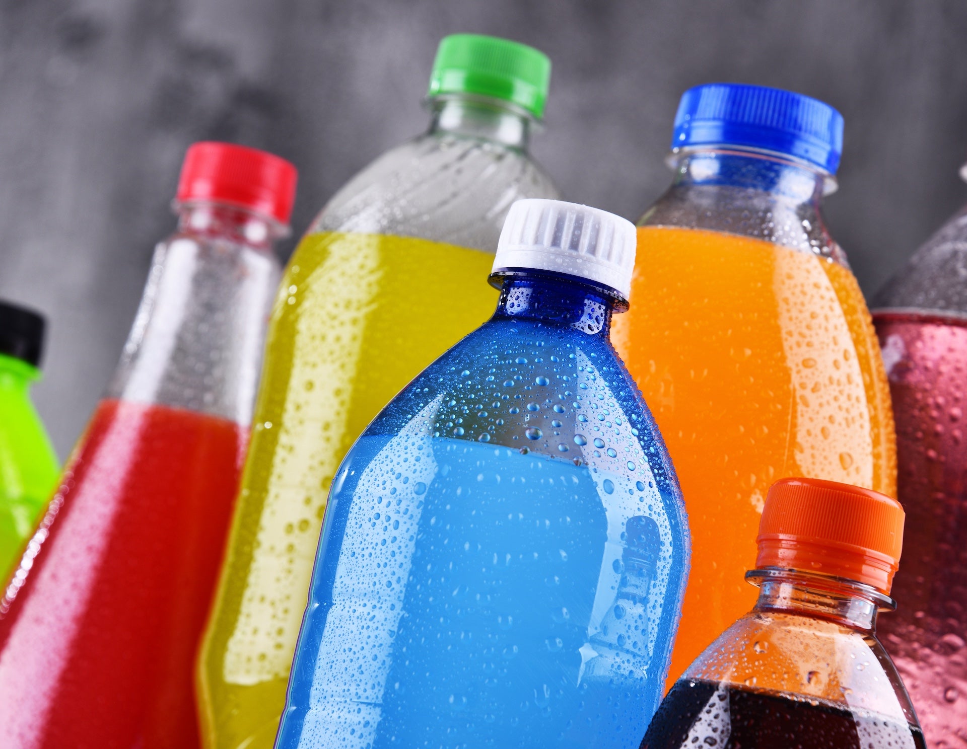 5 Foods & Drinks That Dim Your White Smile Sugary Sodas & Sports Drinks